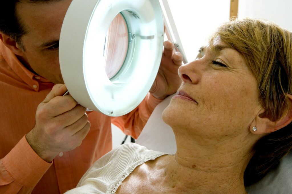 Man looking at womans face close up