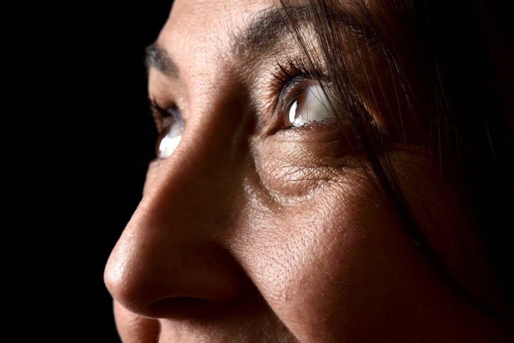 older woman wrinkles face close up